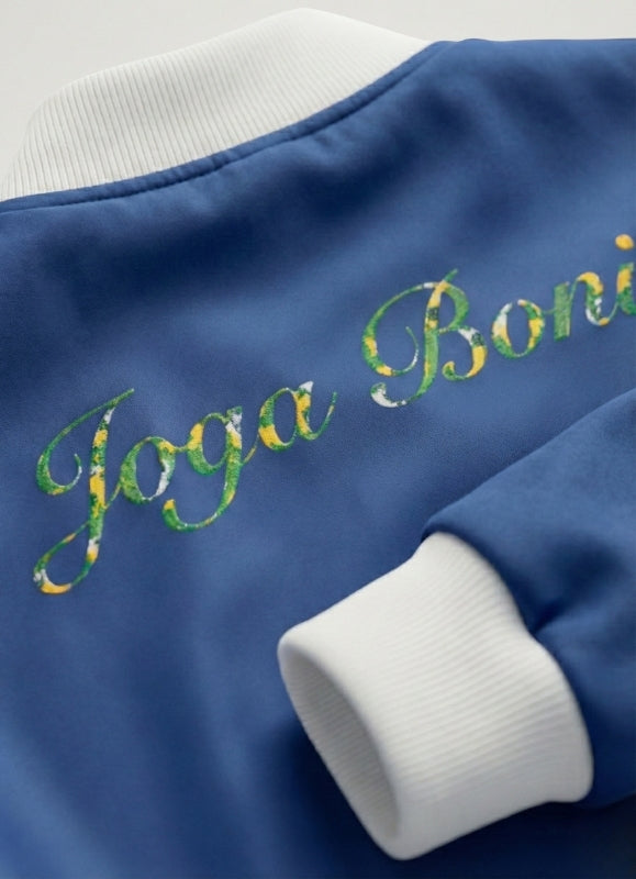 Blue jacket with 'Joga Boni' text on a white background