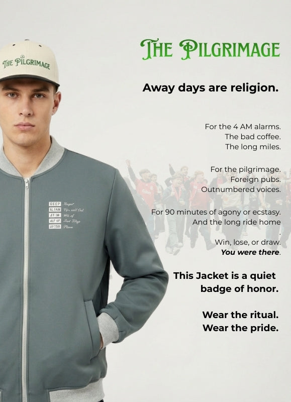 Man wearing a gray jacket with text and logo on a light gray background