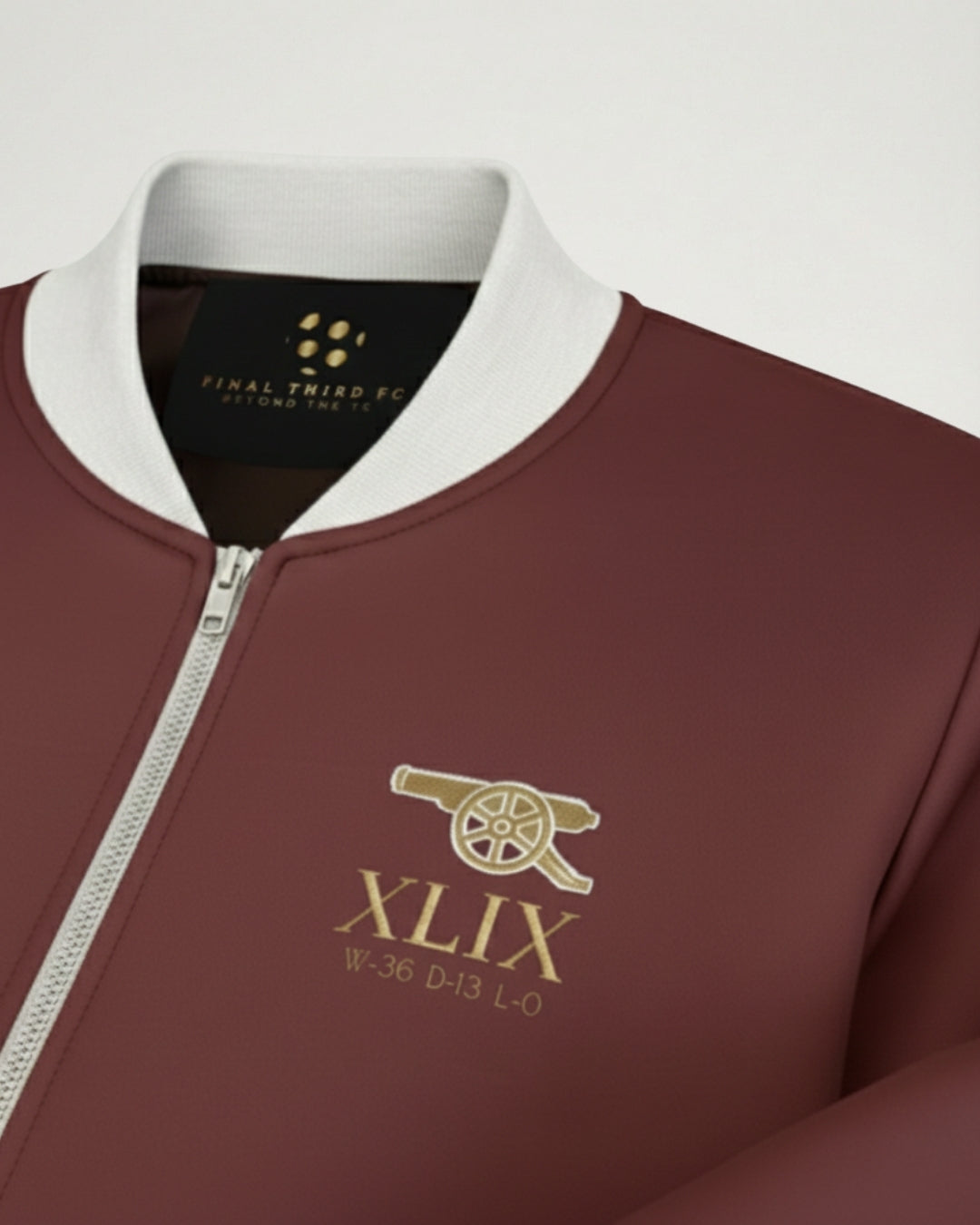 Maroon jacket with white collar and gold logo and text on a light gray background