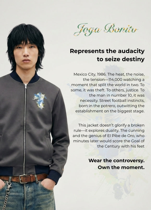Person wearing a gray bomber jacket with floral design, standing against a white background with text.